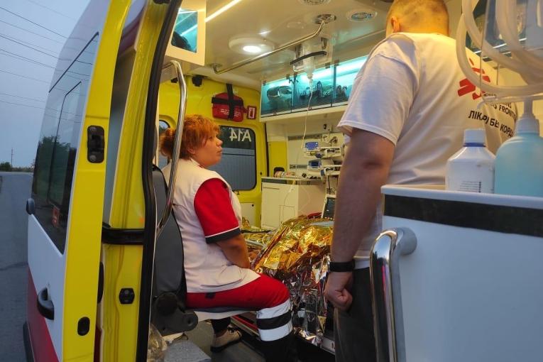 MSF paramedics transfer a patient injured during a missile attack in Kostiantynivka