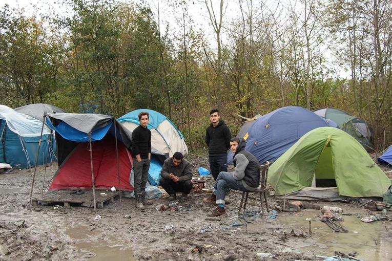 Des réfugiés dans le camp de Grande Synthe.