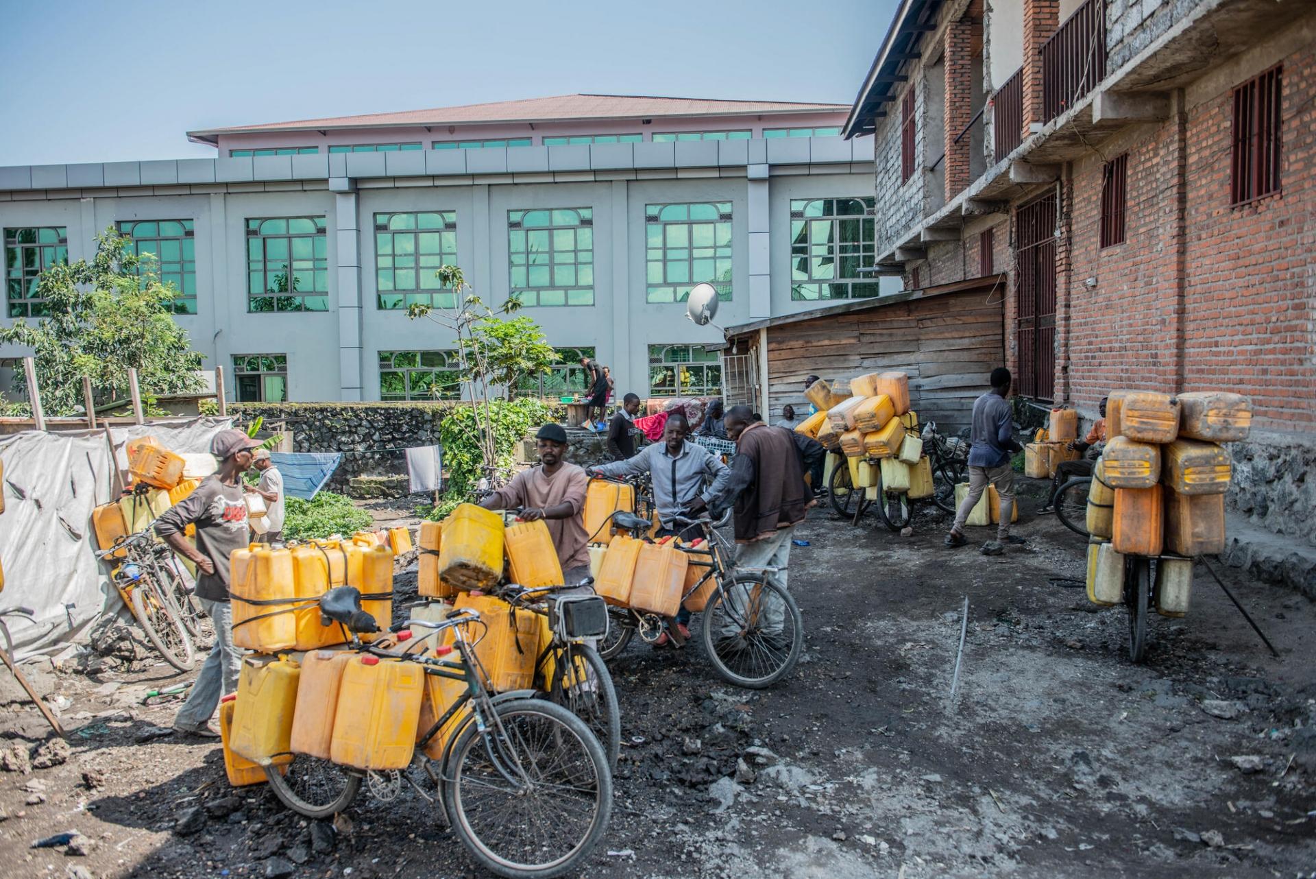    "To avoid making the population suffer even more or making them sick, we do not sell water from the lake but that from the tap" - Jean-Claude Bazibuhe Selling water has been my job for 17 years, since I left the army. I am part of the association of water dealers on bicycles in Goma, a structure that allows us in this particular period to supply the population with drinking water to fight against cholera and other water-borne diseases. The demand for potable water is on the rise due to damage to the city