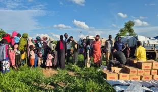 Distribution d'articles de première nécessité à Hadra, dans l’État du Kordofan du Sud, au Soudan.