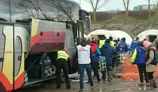 Les migrants s'installant dans le nouveau camp de la Linière le 7 mars 2016