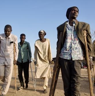 Wounded men from El Fasher